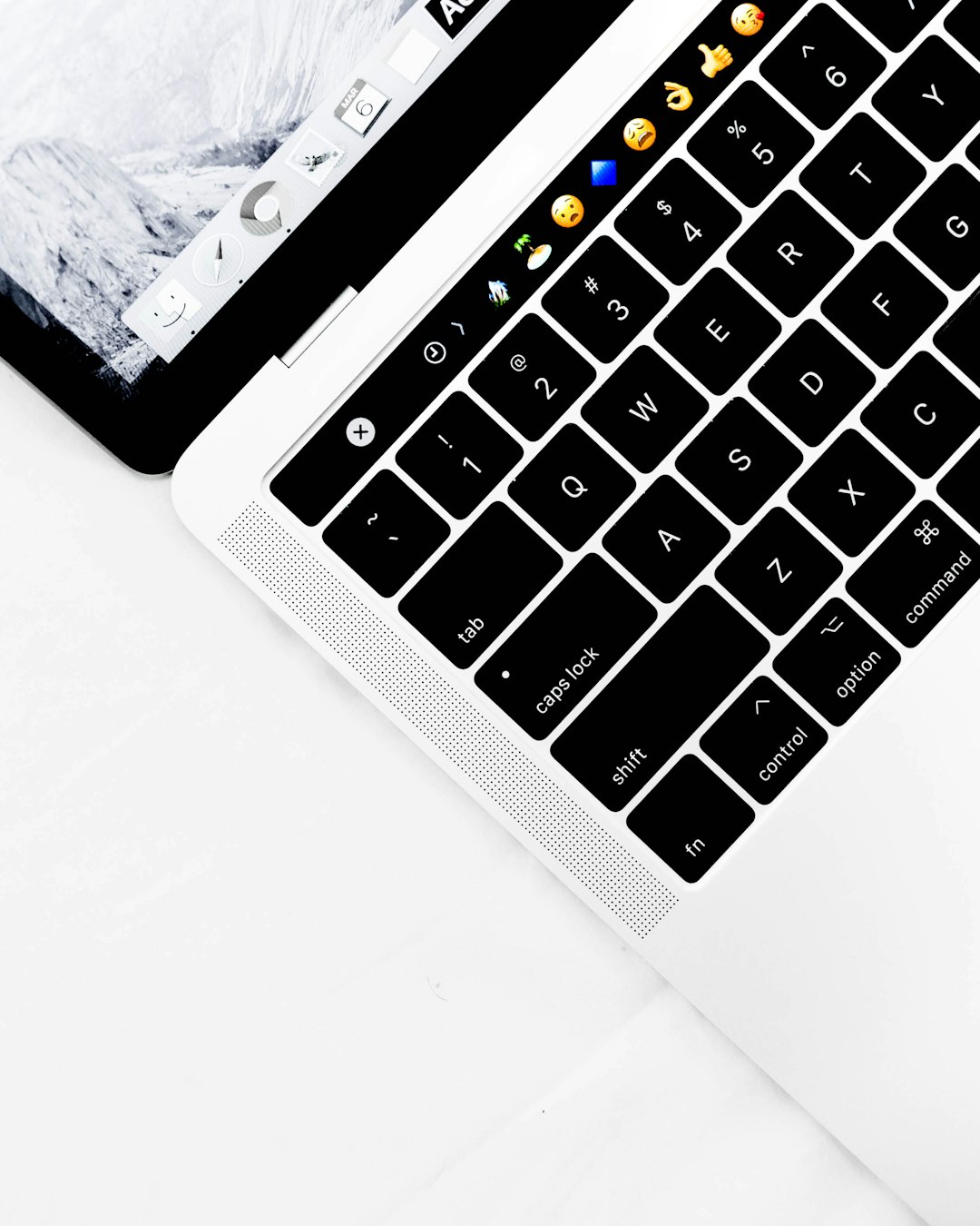 a close up of the keyboard on an apple macbook pro, white background with emoticons and symbols on it, high resolution, white desk top, high angle view, white background, black keys, high quality photo, white backgrounnd, high detail, white backdrop, white table surface, white laptop screen, white computer, white office table, white laptop keyboard, white mac book, white laptop on white desk –ar 51:64