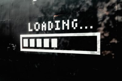 Black and white pixel art of the word "Ionizing" in a loading bar with an empty progress bar, video game aesthetic, minimalistic, simple style on a black background, pixelated. The artwork is done in the style of Ionizing. --ar 128:85