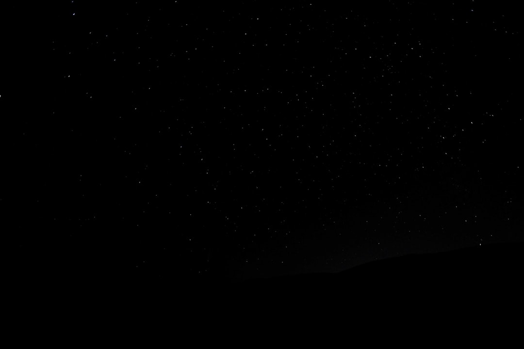 a black sky with stars, night sky, minimalistic, simple, flat illustration, vector design, white space on the left side of screen, hyper realistic, high resolution, high definition, high quality, high detail, hyper detailed, high contrast, sharp focus, smooth, no blur, no grainy details, octane render, high angle view, wide shot, cinematic –ar 128:85