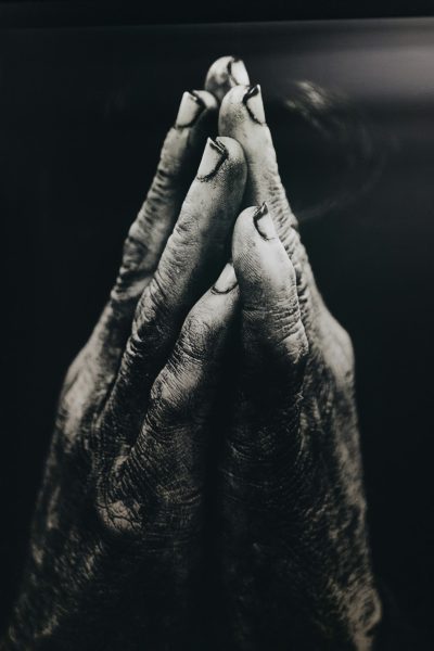 Close up of praying hands, photography in the style of [Richard Kern](https://goo.gl/search?artist%20Richard%20Kern) --ar 85:128