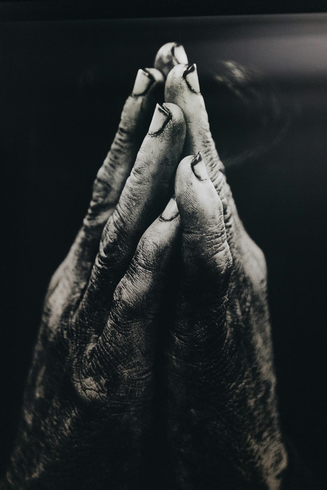 Close up of praying hands, photography in the style of [Richard Kern](https://goo.gl/search?artist%20Richard%20Kern) –ar 85:128