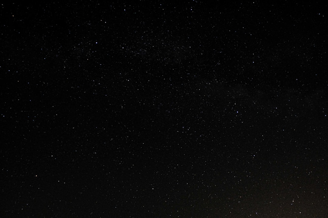 A black sky with stars, low light, in the style of high resolution, photo realistic, wide angle –ar 128:85