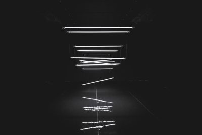 black background, white neon lines floating in the air, minimalism, dark room, black and white --ar 128:85