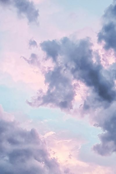 Beautiful pastel sky with clouds, dreamy and ethereal in pink, blue and purple soft focus. Realistic and super detailed close up in the style of fantasy digital art with sharp studio lighting. --ar 85:128