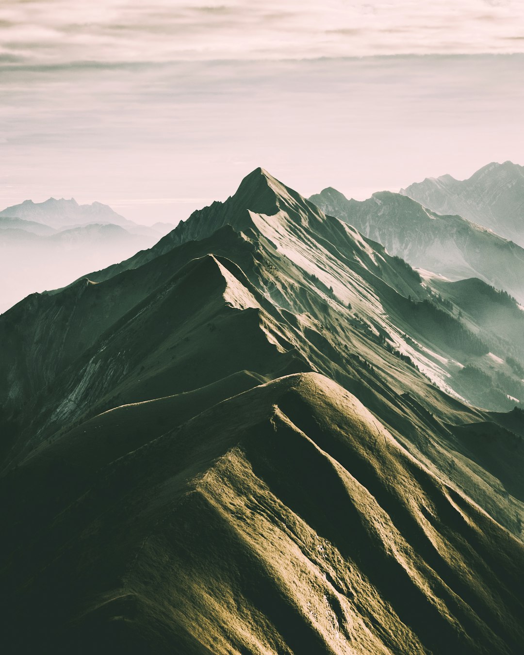 beautiful mountains, cinematic, shot from above, soft light, clean, muted color tones, in the style of NIKON D850 , minimalistic unsplash photography style –ar 51:64