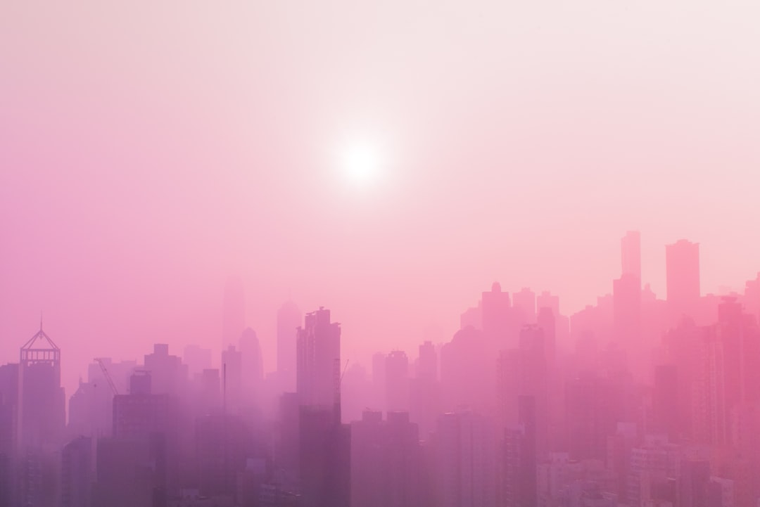 pink sky, gradient, city skyline, skyscrapers, light fog, pink color theme, hyper realistic, detailed, cinematic, raw –ar 128:85