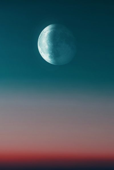 minimalist photography, minimalism, a moon in the sky, dusk, blue and pink gradient background, low saturation colors, high resolution camera, depth of field effect, ultra realistic --ar 85:128