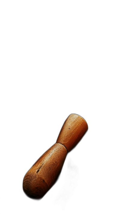 wooden handle, lying on the ground, isolated on black background, in the style of a professional photography studio with light