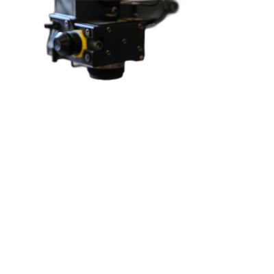 Close up of the top corner of an industrial robotic arm on a black background. The camera is positioned directly above it and below the horizon line, with motion blur. Photorealistic in the style of a studio lighting, cinematic.