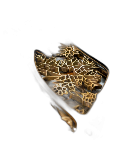 A gold metal and glass clasp with intricate cut patterns, on a black background, in product photography with studio lighting and a high resolution macro lens, creating a hyper realistic style.