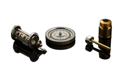 A set of small brass parts, including an analog clock and various metal pieces on a black background. The objects include three different sizes of rubber gaskets with a vintage style, all with reflections on the surface, providing depth to each piece. This composition is captured in high resolution using professional photography techniques, highlighting intricate details that showcase their unique textures and materials in the style of Gab era vintage.